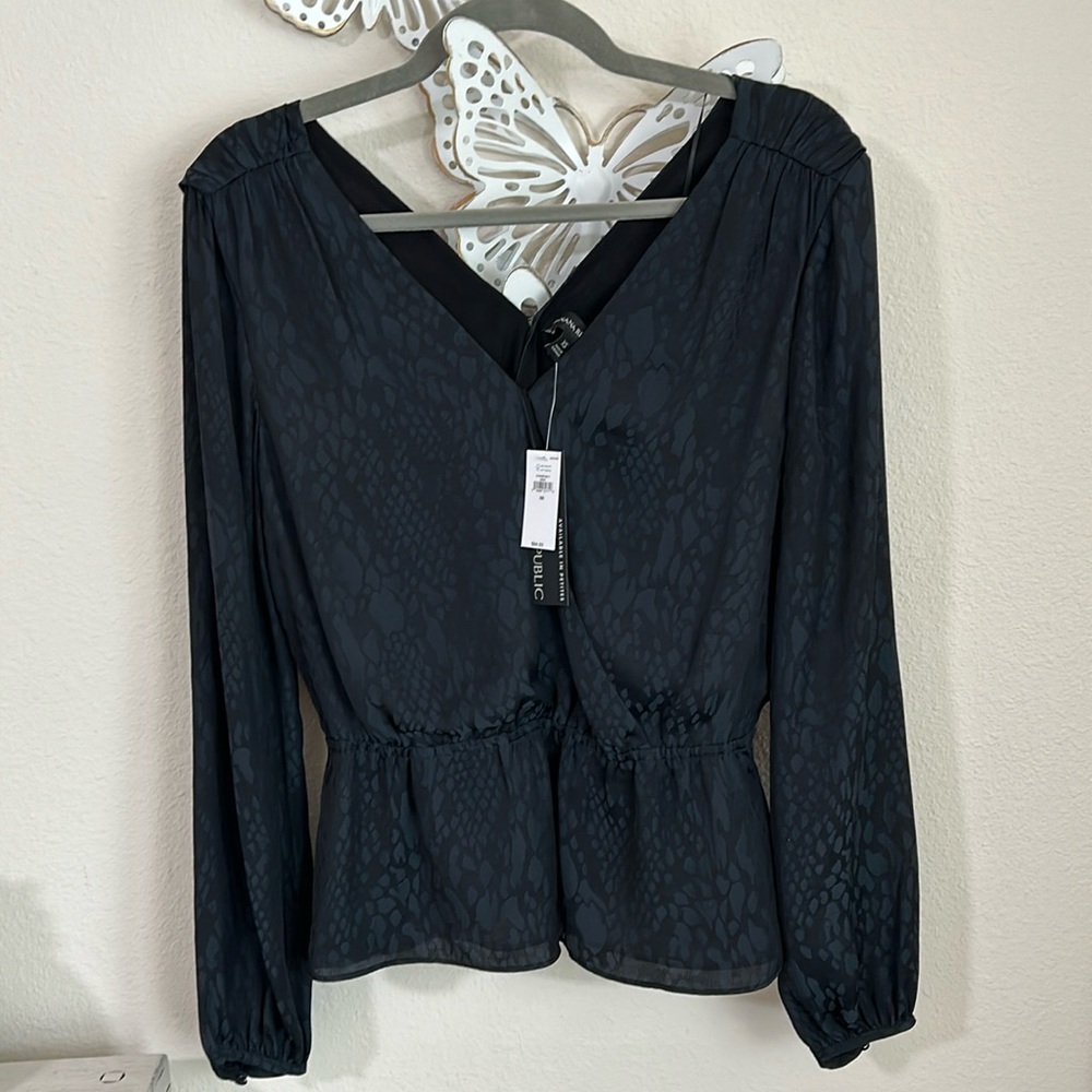 Black leopard peplum blouse